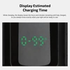 Écran LED vert affichant le temps de charge estimé d'une lampe de poche noire