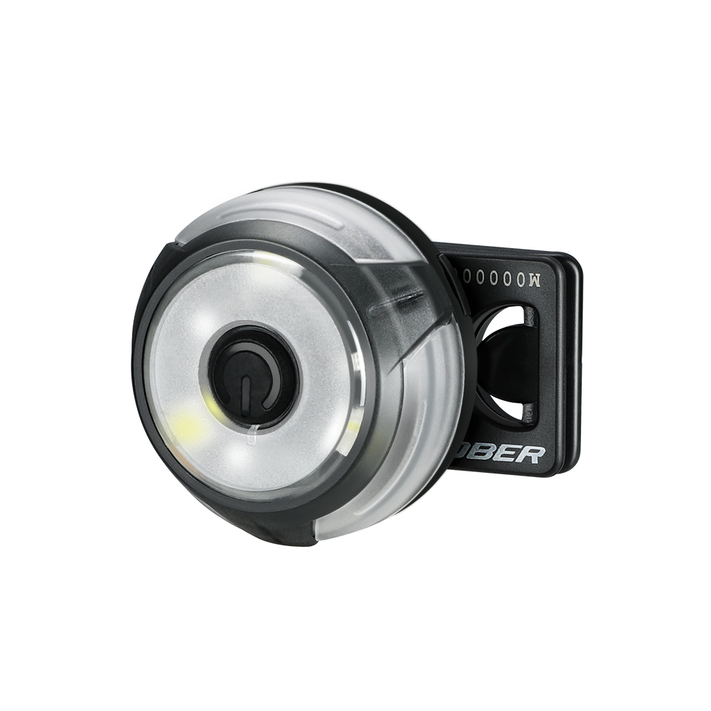 Phare de vélo rond noir et argenté avec bouton d'alimentation, boîtier en plastique et support de montage
