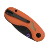 Couteau de poche pliant orange avec clip noir et logo de chauve-souris sur fond noir.