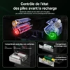 Olight batteries AAA vertes et blanches dans un compartiment de stockage pour piles rechargeables