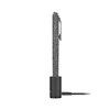 Stylo lampe de poche Olight Open Glow noir rechargeable sur sa base de charge USB pour l'écriture et le transport quotidien