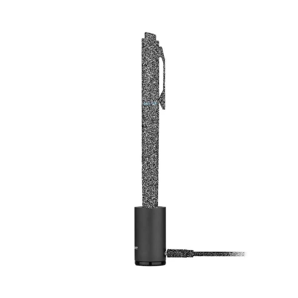 Stylo lampe de poche Olight Open Glow noir rechargeable sur sa base de charge USB pour le transport quotidien EDC