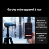 Lunette thermique Topdon sur trépied en forêt enneigée, notification d'échec de mise à jour sur smartphone, maintien à jour.