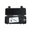 Mallette de transport noire ouverte avec mousse de protection et notice pour hachette pliante de camping Falcilux