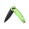 Couteau pliant tactique vert fluo, lame noire, poignée éclaboussée de peinture rouge, accessoire de survie.