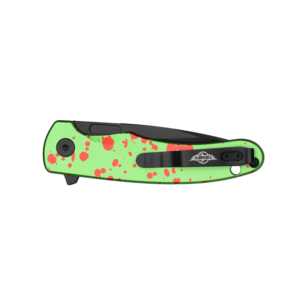 Couteau pliant vert et noir, taches rouges, clip de poche noir, pour transport EDC.
